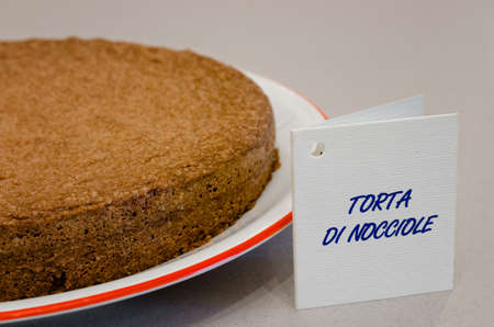 Traditional hazelnut cake made with Piedmont hazelnuts IGP (also known as Tonda Gentile di Langa), typical hazelnut variety of Piedmont, Italyの写真素材