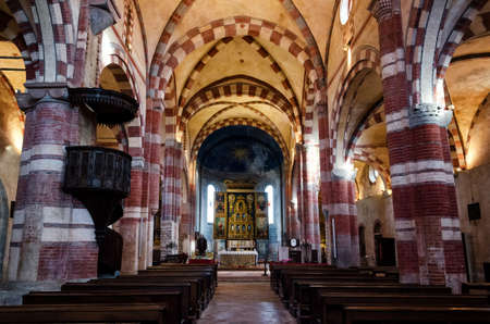 REVELLO, ITALY - JANUARY 22, 2017 â Central nave in the church of the Abbazia di Staffarda (Abbey of Staffarda) romanesque monastery in Revello (Italy) on january 22, 2017のeditorial素材