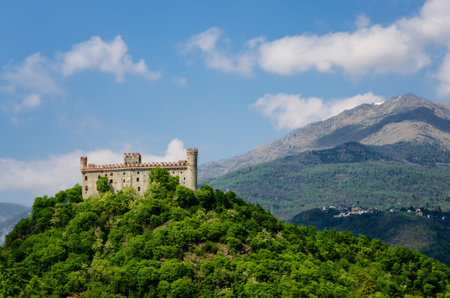 Castle of Montaldo Dora, in Canavese (Piedmont, Italy) with Alps on the backgroundのeditorial素材