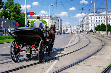 VIENNA, AUSTRIA - MAY 17, 2017: traditional horse driven coach in the streets on Vienna, Austria, on may 17, 2017のeditorial素材