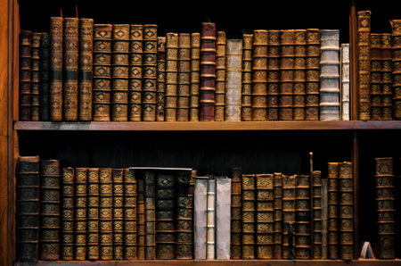 Ancient tomes on an antique wooden bookshelf