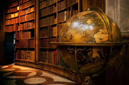 VIENNA, AUSTRIA - MAY 20, 2017: Main hall of the historical Austrian National Library in Vienna (Austria) on may 20, 2017, with an ancient globe mapのeditorial素材