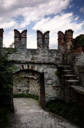 Castle walls with battlements, merlons and wooden portalsの写真素材