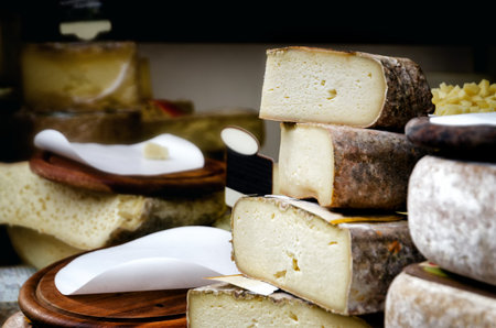 traditional hard cheese on a market stall in Italy