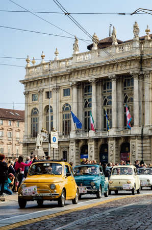 TURIN, ITALY - SEPTEMBER 24, 2017 - Old Fiat 500 parade during a classic car rally in Piazza Castello Square, Turin (Italy) on september 24, 2017. Turin was the city where Fiat was born in 1899のeditorial素材