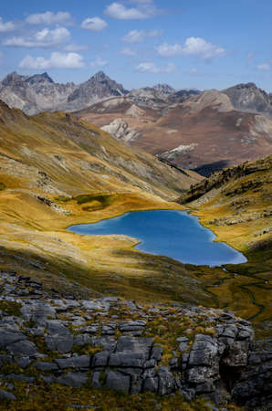 Lake of Lauzanier in Val de l'Ubayette, in the mountains of Mercantour National Park, between France and Italyの写真素材