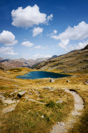 Lake of Lauzanier in Val de l'Ubayette, in the mountains of Mercantour National Park, between France...