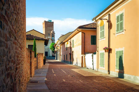 View of the medieval tower and the town center of Barbaresco, one of the main villages of the wine district of Langhe, in Piedmont, Italyの写真素材