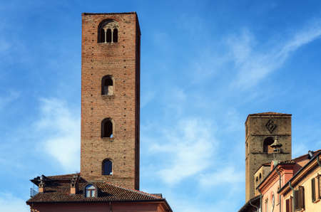 detail of Piazza Risorgimento, main square of Alba (Piedmont, Italy) with the medieval towersのeditorial素材