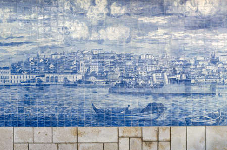 LISBON, PORTUGAL - FEBRUARY 2, 2019: Panorama of Lisbon in traditional azulejos art in Alfama district of Lisbon, Miraduro de Lanta Luzia, Portugal, with tiles painted on the wall on february 2, 2019のeditorial素材