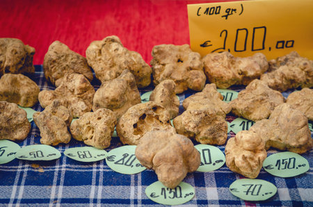 White Truffles (Tuber Magnatum Pico) on a trader stallの写真素材