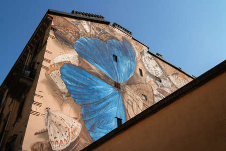 Turin, Italy - July 31, 2020: famous butterflies murales in aurora neighborhood, turin (Italy), near Lavazza building on july 31, 2020. The painting is a landmark and part of a street art projectのeditorial素材