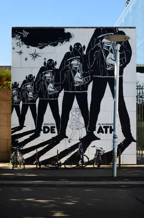Strasbourg, France - July 12, 2020: External view of Strasbourg Museum of Modern and Contemporary art, with the walls painted in black and white urban art by Faile (From the air we share)のeditorial素材
