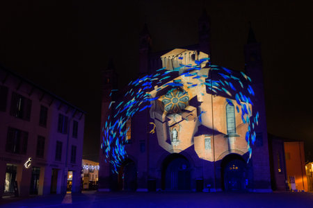 Alba, Italy - November 21, 2021 - Light mapping over the Saint Lawrence cathedral of Alba (Piedmont,...