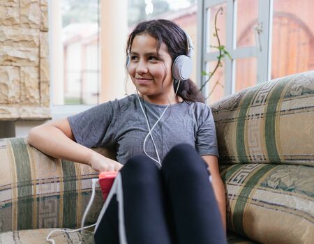 girl listening musicの写真素材