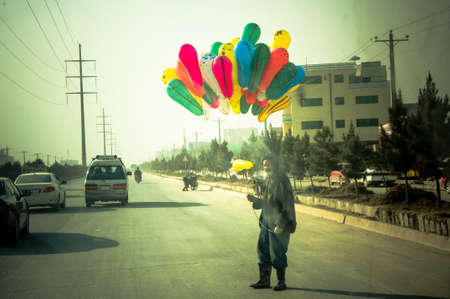 Old man selling colors in Kabul, Afghanistanのeditorial素材