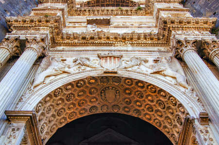 Coat of arms at the main entrance of the castle Maximo Angioina of Naplesのeditorial素材