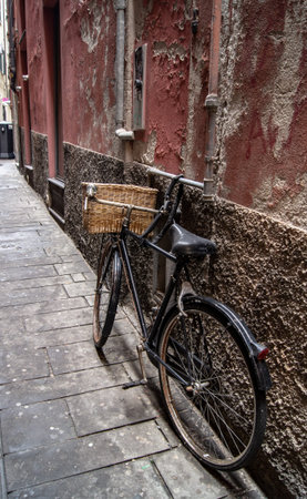 Old bicycle on the street of Barcelonaの写真素材