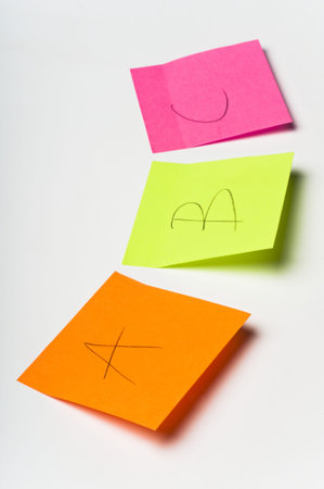 first letters of the alphabet written on colorful sticky notes