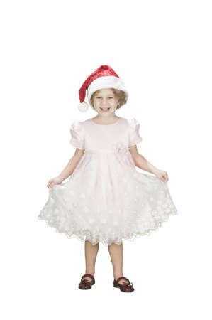 adorable toodler girl wearing santa's hat isolated on whiteの写真素材
