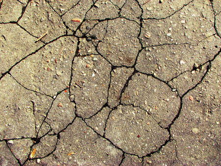 Texture of stone with cracks and dirtの写真素材