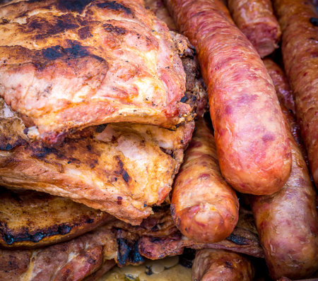 Delicious fried pork meat. Sausage and pork fillets home cooked.