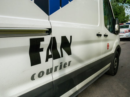 Bucharest/Romania - 05.01.2020: Fan Courier delivery van on the streets of Bucharest. FAN Courier is the largest delivery company in Romania.のeditorial素材