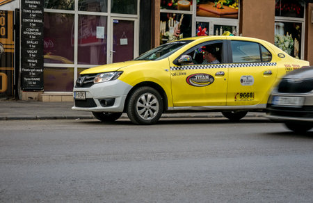Bucharest/Romania - 05.01.2020: A car on the street belonging to Titan taxi company, War between taxi companies and ride hailing companies like Uber, Bolt, Yango...のeditorial素材