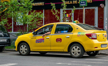 Bucharest/Romania - 05.01.2020: A car on the street belonging to Speed taxi company, War between taxi companies and ride hailing companies like Uber, Bolt, Yango...のeditorial素材