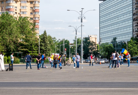 Bucharest/Romania - 05.17.2020: People in front of the romanian government ( Victory Square)protesting against the measures taken by the authorities regarding coronavirus situation.のeditorial素材