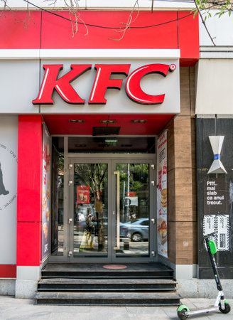 Bucharest/Romania - 05.07.2020: Entrance to KFC fast food restaurant near Cismigiu park in Bucharest.のeditorial素材
