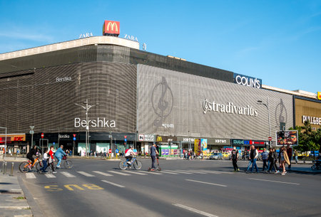 Bucharest/Romania - 05.30.2020: People crossing the street in front of Unirea Shopping Center in Bucharest.のeditorial素材