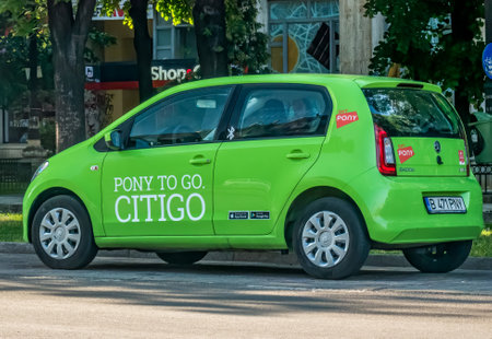 Bucharest/Romania - 05.30.2020: Logo of Pony Car Sharing company inscriptioned on a green car.のeditorial素材
