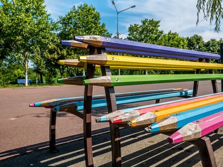 A bench made of big wooden colored pencils.の写真素材