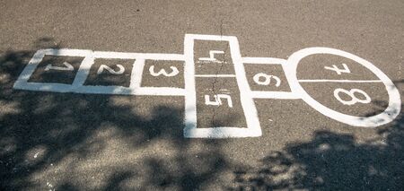 Hopscotch children's game painted on the pavement.の写真素材