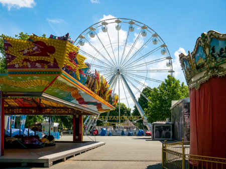 Bucharest/Romania - 03.06.2020: Aamusement park called Children's World Park in Bucharest.. Fun park with ferry wheel, bumper cars and other attractions.のeditorial素材