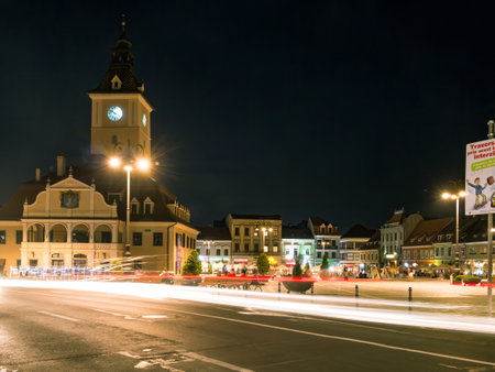 Brasov/Romania - 06.28.2020: Brasov city hall building located in the old town Council Square. Brasov's main square long exposure night photo.のeditorial素材