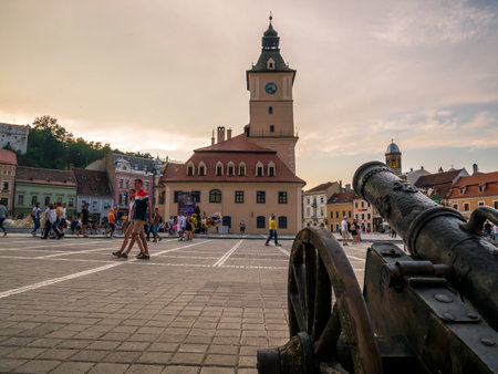 Brasov/Romania - 06.28.2020: Brasov city hall building located in the old town Council Square. Brasov's main square at sunset.のeditorial素材