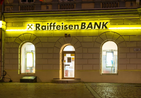 Brasov/Romania - 06.28.2020: Raiffeisen bank branch in the old town of Brasov, Council Square.のeditorial素材