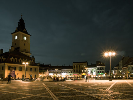 Brasov/Romania - 06.28.2020: Brasov city hall building located in the old town Council Square. Brasov's main square at sunset or night.のeditorial素材