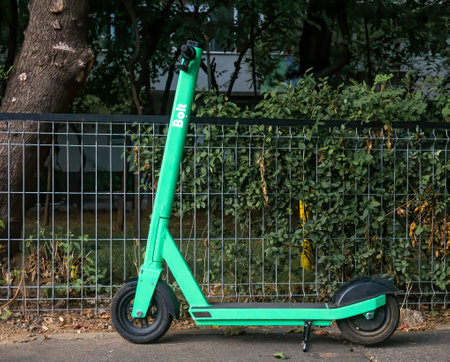 Bucharest/Romania - 07.15.2020: Parked electric scooter for rental in Bucharest belonging to ride hailing company Bolt .のeditorial素材