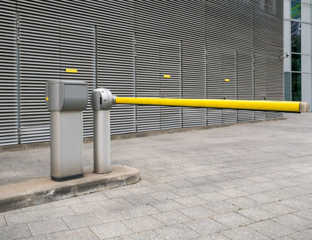 Automatic yellow barrier at the entrance of a business park in Bucharest