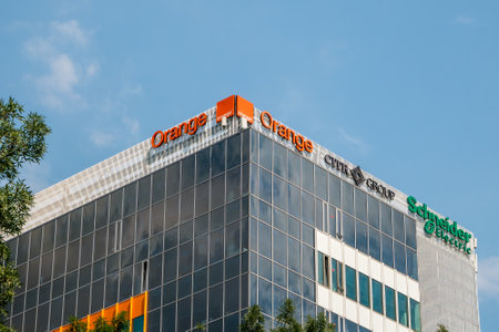 Bucharest/Romania - 07.18.2020: Modern office building in Bucharest with many company logos.のeditorial素材