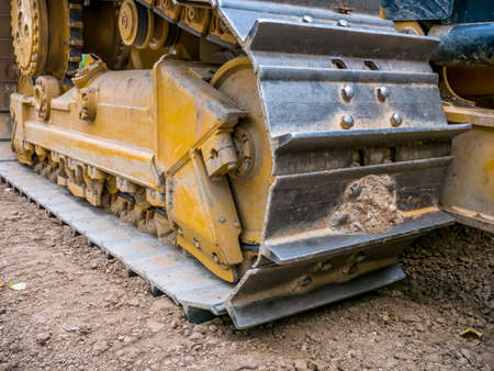 Close up detail with chain tracks of a bulldozerの写真素材