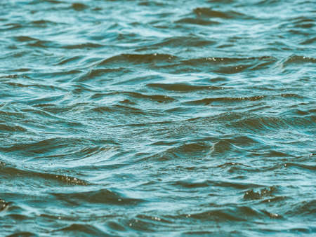 Blue or green water ripples texture background.の写真素材