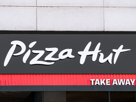 Bucharest/Romania - 10.17.2020: Pizza Hut take away restaurant and fast food in Bucharest. Pizza Hut logo.のeditorial素材