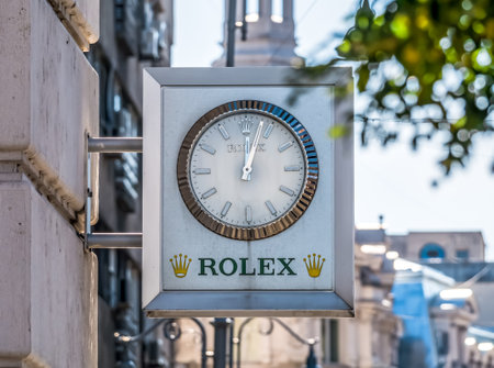 Bucharest/Romania - 10.17.2020: Rolex outdoor clock on a old building in Bucharest. Rolex SA is a Swiss luxury watch manufacturer based in Genevaのeditorial素材