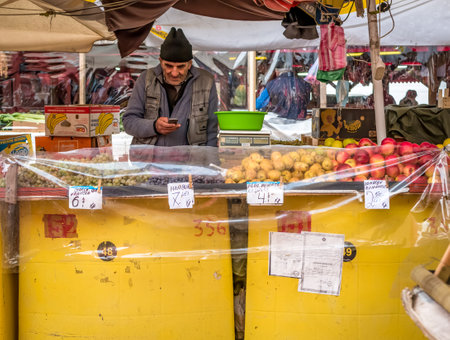 Bucharest/Romania - 11.20.2020: Fresh fruits on display in a market in Bucharest. with prices in romanian currencyのeditorial素材