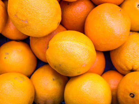Fresh organic oranges on display at the market.