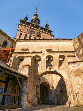 Sighisoara Romania - 11.26.2020: The iconic Clock Tower (Turnul cu ceas) Built in the 14th century. Historical landmark in the medieval town of Sighisoara.のeditorial素材